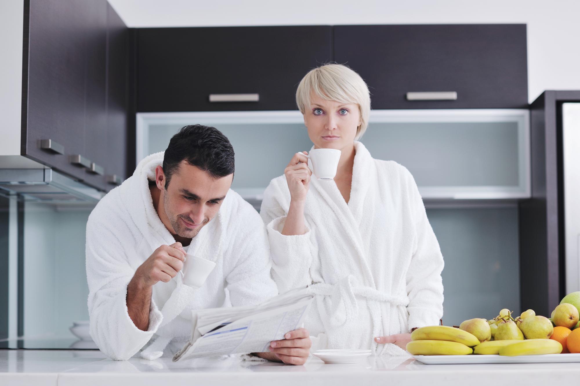 Chef and consultant discussing workflow in a kitchen